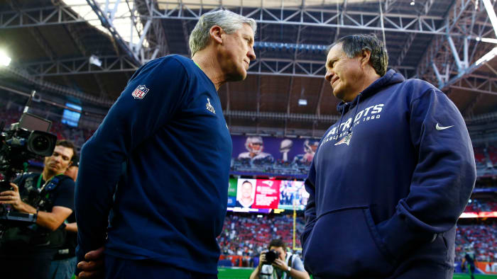 Pete Carroll and Bill Belichick speak before Super Bowl XLIX
